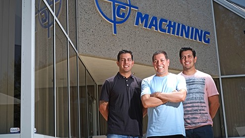 AG Machining owner Angel Garcia, middle, stands with his twin sons Bryan, left, and Eddie. (Stephen Nellis / Business Times photo)