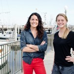 Norah Eddy, left, and Laura Johnson are founders of Salty Girl Seafood. The startup, spun out of the UC Santa Barbara Bren School of Environmental Science and Management, aims to make it easier for restaurants to source seafood directly from fishermen. (Alex Drysdale / Business Times photo)