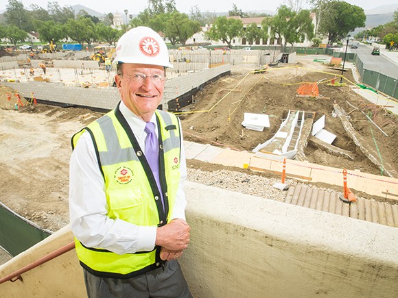 CSU Channel Island President Richard Rush stands near construction of a new chemistry lab building on the campus. CSUCI has embarked on a $600 million campus build-out. (Nik Blaskovich / Business Times photo)
