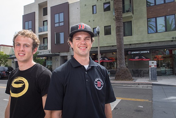Daniel Dunietz, left, owns Buddha Bowls in Isla Vista, while Sean Evans owns the Jimmy John’s restaurant next door. Both entrepreneurs are in their 20s and moved to the college town to start their own businesses. (Nik Blaskovich / Business Times photo)