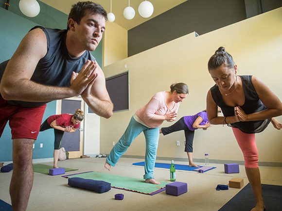 Employees at software firm Mindbody enjoy benefits ranging from on-site yoga classes to opportunities to play Frisbee and board games. It’s all part of maintaining a happier workforce, the company said, which in turn leads to lower insurance costs. (Nik Blaskovich photo)