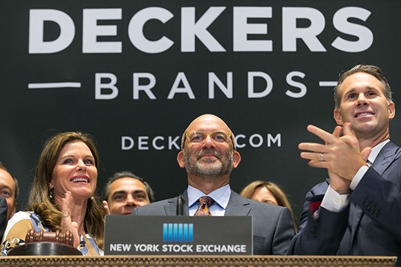 Deckers Outdoor Corp. CEO, President and Chairman Angel Martinez and members of the company’s leadership team ring the opening bell at the New York Stock Exchange on Sept. 4. (courtesy photo by Ben Hider of NYSE)