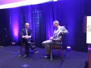 Labor Secretary Thomas Perez, left, and Bernie Kohn of Bloomberg News at the Society of American Business Editors and Writers conference in Washington, D.C.